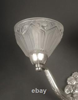 A. Fichet/Hanots Pair of Art Deco Wall Sconces in Bronze and Molded Pressed Glass A. Fichet/Hanots Pair of Art Deco Wall Sconces in Bronze and Molded Pressed Glass