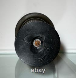 Antique Art Deco bronze bowl adorned with an African marabout holding a snake