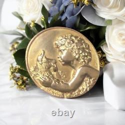 Antique bronze brooch, The Faun with the Antelope by François Maurice Thénot