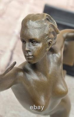 Art Deco Bronze Figural Sculpture by Raymonde Guerbe: Woman Holding a Shield