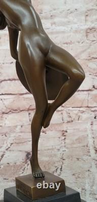 Art Deco Bronze Figural Sculpture by Raymonde Guerbe: Woman Holding a Shield