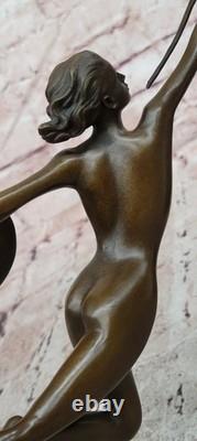 Art Deco Bronze Figural Sculpture by Raymonde Guerbe: Woman Holding a Shield