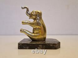 Art Deco Pair of Elephant Bookends in Gilded Bronze and Stone from the 1930s