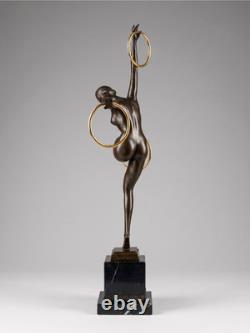 Art Deco bronze dancer sculpture with rings on a marble-effect base