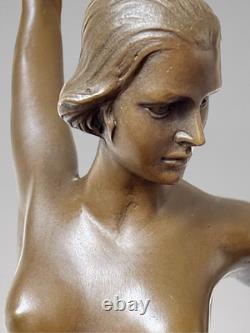 Art Deco bronze dancer sculpture with rings on a marble-effect base