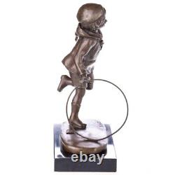 Art Deco bronze figure of a boy with hoop: 'Boy with Hoop' after DHChiparus Vintage