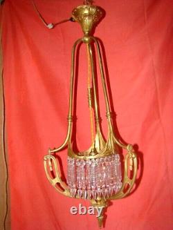 Art Deco era bronze chandelier adorned with cut crystal prisms