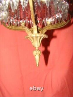 Art Deco era bronze chandelier adorned with cut crystal prisms