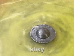 Art Deco footed Schneider cup in bronze, orange/yellow marbled glass, signed