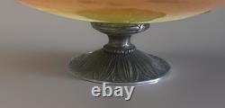 Art Deco footed Schneider cup in bronze, orange/yellow marbled glass, signed