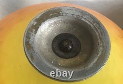 Art Deco footed Schneider cup in bronze, orange/yellow marbled glass, signed