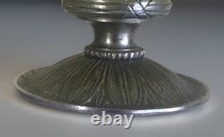 Art Deco footed Schneider cup in bronze, orange/yellow marbled glass, signed