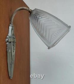 Art Deco wall sconce with silvered bronze mount and molded pressed glass