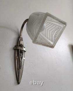 Art Deco wall sconce with silvered bronze mount and molded pressed glass