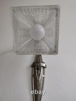 Art Deco wall sconce with silvered bronze mount and molded pressed glass