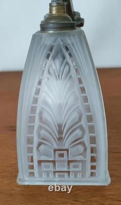 Art Deco wall sconce with silvered bronze mount and molded pressed glass