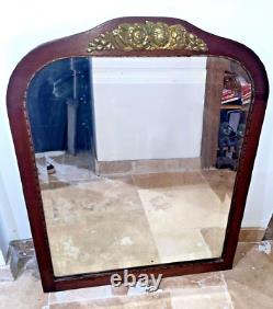 Beautiful beveled mirror in wood and bronze Art Deco