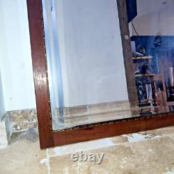 Beautiful beveled mirror in wood and bronze Art Deco