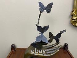 Bronze sculpture of a hand releasing butterflies, Art Deco, signed