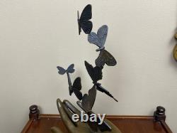 Bronze sculpture of a hand releasing butterflies, Art Deco, signed