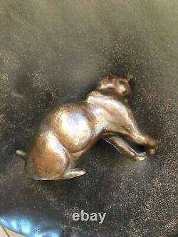 Charming small Art Deco bronze cat with a ball