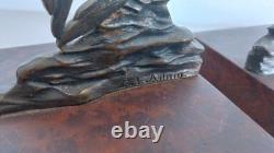 E. L. Adnin Pair of Art Deco bronze bookends depicting two stylized doves