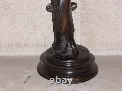 Elegant woman bronze statuette with little dog, 1920s Art Deco style, Roaring Twenties