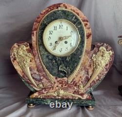 Exceptional and rare Art Deco clock in gilded bronze and Persian red marble