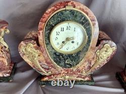Exceptional and rare Art Deco clock in gilded bronze and Persian red marble