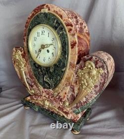 Exceptional and rare Art Deco clock in gilded bronze and Persian red marble