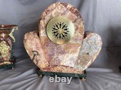 Exceptional and rare Art Deco clock in gilded bronze and Persian red marble