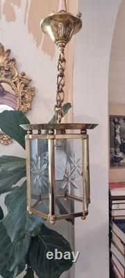 French Art Deco bronze chandelier in a hexagonal shape with six thick cut glass panels