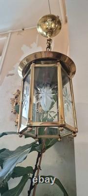 French Art Deco bronze chandelier in a hexagonal shape with six thick cut glass panels