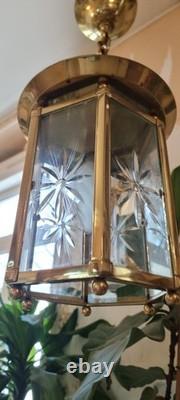 French Art Deco bronze chandelier in a hexagonal shape with six thick cut glass panels