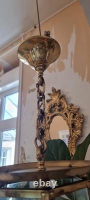 French Art Deco bronze chandelier in a hexagonal shape with six thick cut glass panels