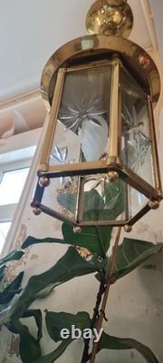 French Art Deco bronze chandelier in a hexagonal shape with six thick cut glass panels
