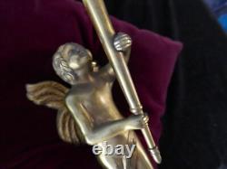 Important pair of gilded bronze candelabra 6 kg with loves H 35cm, 20th century style