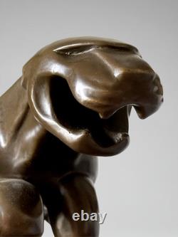 Large Art Deco Jaguar sculpture in patinated bronze on an architectural black base