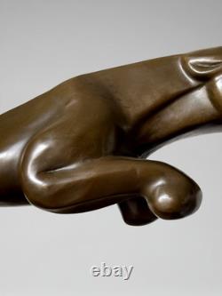 Large Art Deco Jaguar sculpture in patinated bronze on an architectural black base