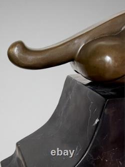 Large Art Deco Jaguar sculpture in patinated bronze on an architectural black base Large Art Deco Jaguar sculpture in patinated bronze on an architectural black base