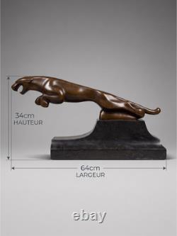 Large Art Deco Jaguar sculpture in patinated bronze on an architectural black base