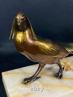 Large subject of a pheasant in iridescent bronze on an onyx terrace, Art Deco period