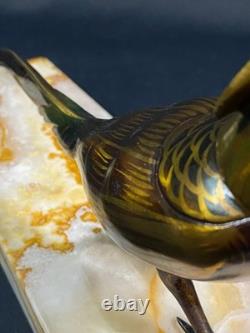 Large subject of a pheasant in iridescent bronze on an onyx terrace, Art Deco period