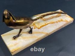 Large subject of an iridescent bronze pheasant on an onyx terrace, Art Deco period
