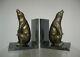 Pair Of Greenhouse Books. Bear In Bronze