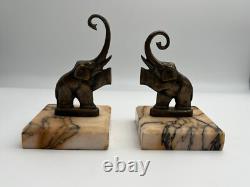 Pair of Art Deco bronze bookends signed Perrin