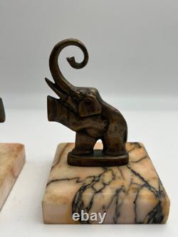 Pair of Art Deco bronze bookends signed Perrin