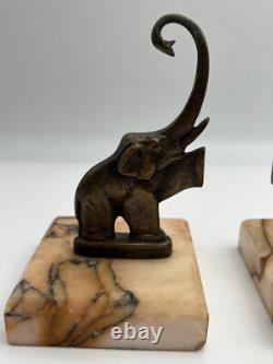 Pair of Art Deco bronze bookends signed Perrin