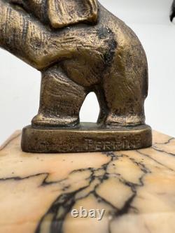 Pair of Art Deco bronze bookends signed Perrin