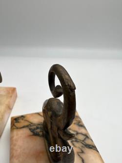 Pair of Art Deco bronze bookends signed Perrin